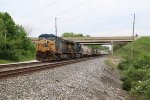 K466 heads west with a mix of grain cars and empty ethanol tanks